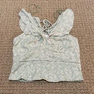 Light green floral blouse